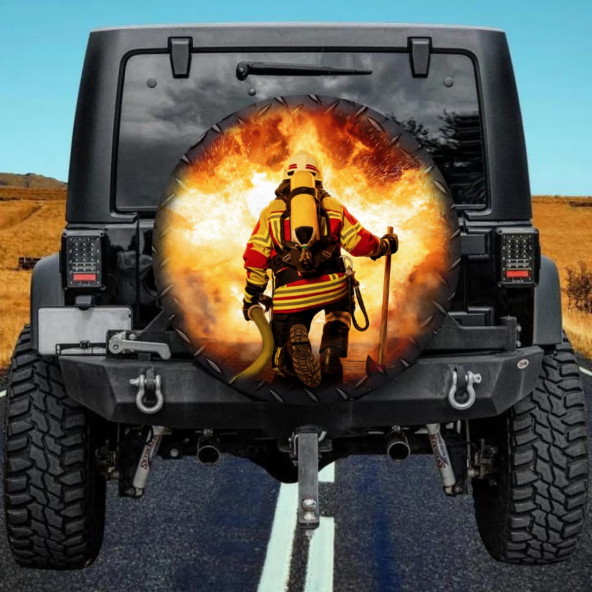Firefighter Kneeling in Intense Flames Spare Tire Cover